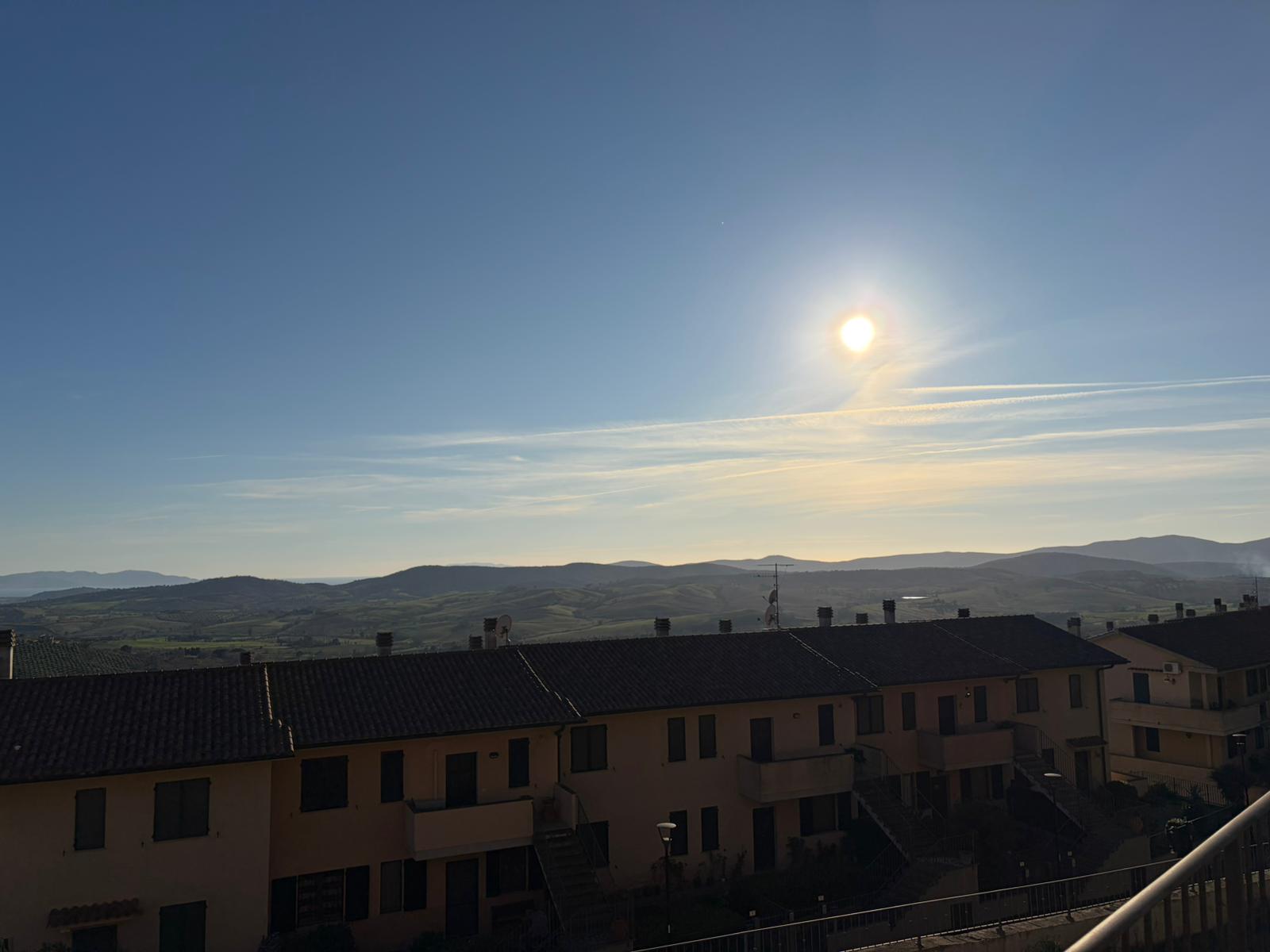 Panoramic view over the Tuscan Maremma hills and Monte Argentario from Montiano